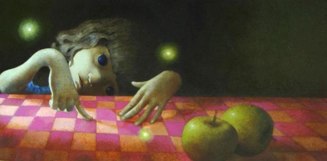 niña con manzanas
